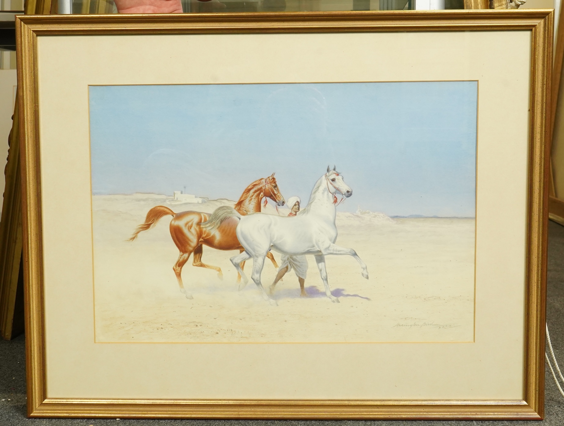 John Alexander Harrington Bird (English, 1846-1936), Groom leading two Arabian horses, buildings beyond, watercolour and pencil, 37 x 55cm